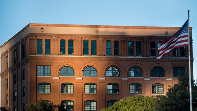 A view of the Dallas County Administration Building which formerly housed the Texas School Book Depository, in Dallas, Texas. (Photo by Brendan SMIALOWSKI / AFP)