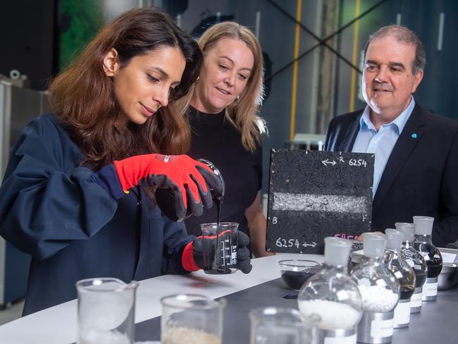 BUILDERS on Victoria's major projects will have to show they use recycled materials to make roads and railway tracks under new circular economy policies introduced by the Andrews Government. Alexis Davison, Director Program Services and Engineering for Major Road Projects Victoria, Michael Caltabiano, CEO of ARRB, and Senior Research Leader Pavements, Negin Zhalehjoo (pouring bitumen).Picture Jay Town