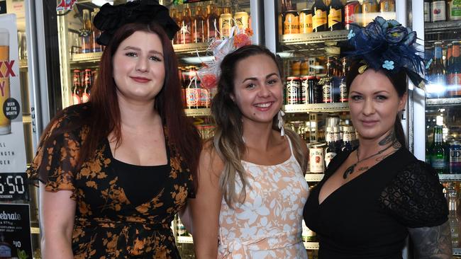 Melbourne Cup at the Noonamah Hotel, famous frog races .Maya Moon, Kyla Innes and Tessa Hancock. Picture KATRINA BRIDGEFORD.