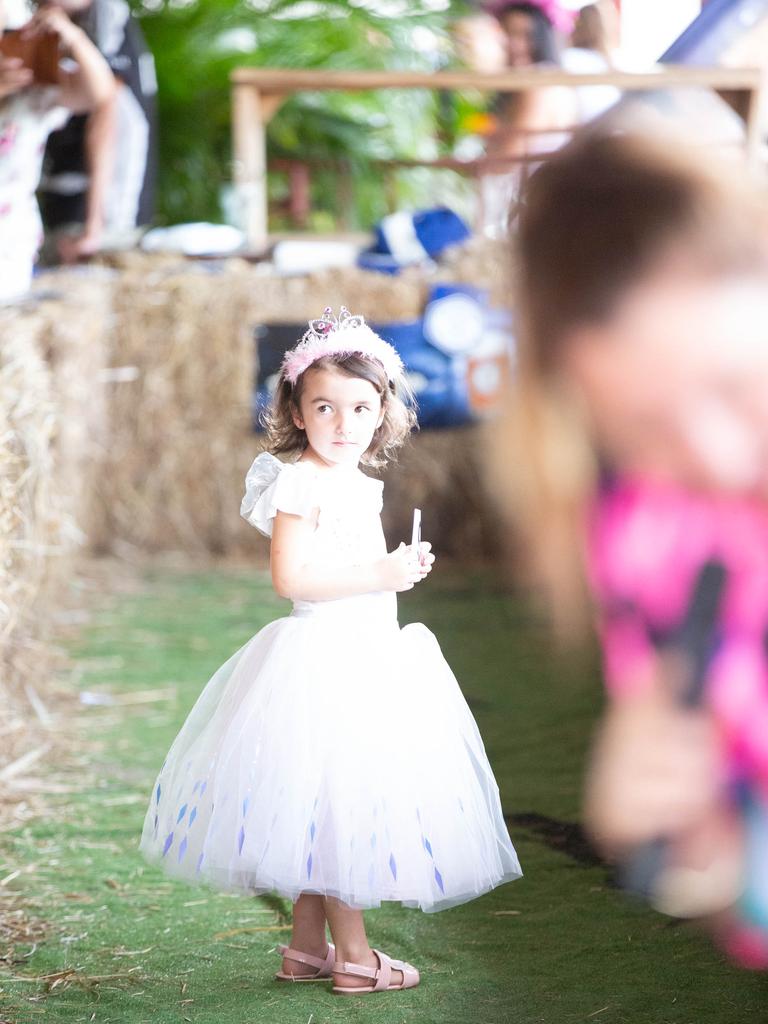 Croc racing at the Berry Springs Tavern for Melbourne Cup Day: Shayla Holmes, 4, takes part in the ‘Fashions in the Bush’ event. Picture: GLENN CAMPBELL