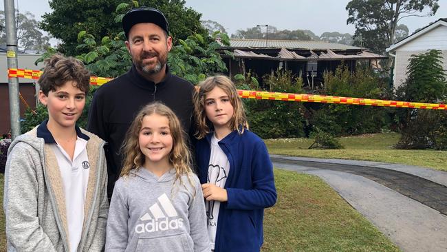 Pedro Nunes, pictured with his children Vincent, 12, Zoe, 8 and Francisco, 9, joined with a group of neighbours to help rescue an elderly couple from the first floor of their burning home in Dublin Ave, Killarney Heights, before firefighters arrived. Picture: Jim O'Rourke