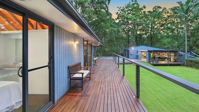 The property comes with a long, timber deck.