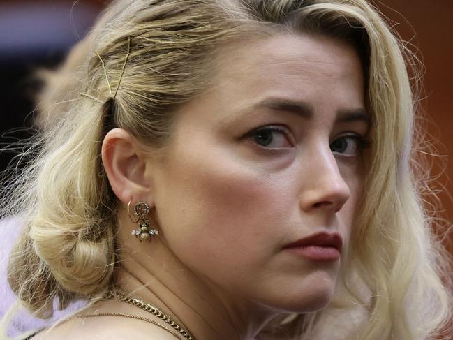 Amber Heard said she kept a binder dating back to 2011 detailing alleged abuse by Johnny Depp - notes that were not tendered in court, along with thousands of pages now unsealed. Picture: AFP