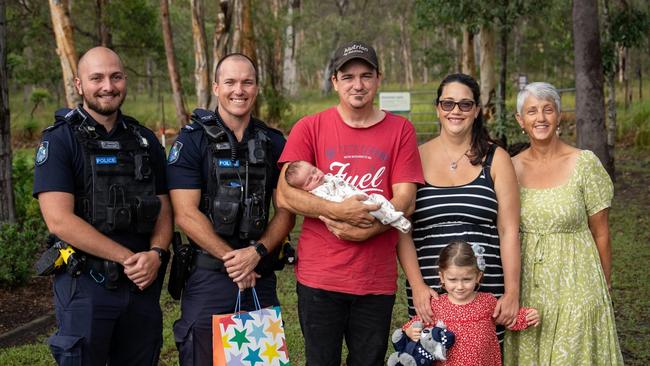 Constables Jacob Pennisi and Philippe Stigner were returning from morning callouts when they were flagged down by Nathaniel Pedler, whose wife Julie was in labour. Photo: Queensland Police Service