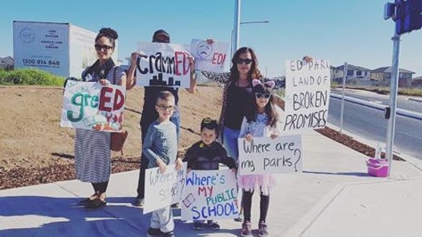 Protesters at the opening of the Bernera Rd extension in Edmondson Park.