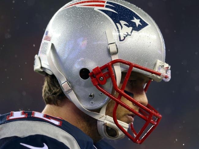 FOXBORO, MA - JANUARY 18: Tom Brady #12 of the New England Patriots looks on in the third quarter against the Indianapolis Colts of the 2015 AFC Championship Game at Gillette Stadium on January 18, 2015 in Foxboro, Massachusetts. Jim Rogash/Getty Images/AFP == FOR NEWSPAPERS, INTERNET, TELCOS & TELEVISION USE ONLY ==