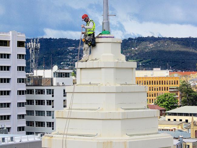 Roped access workers on Hobart's T&G tower.