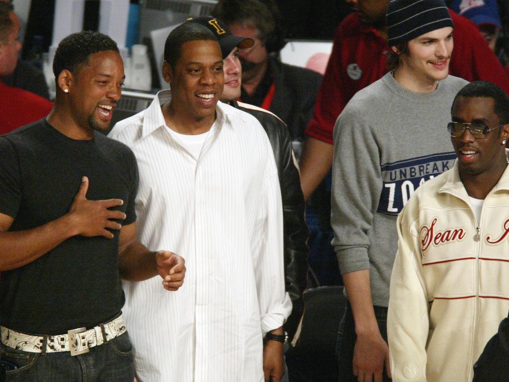 Jay-Z in 2004 with Will Smith, Ashton Kutcher and how jailed music producer Sean “P Diddy” Combs. Picture: Getty Images