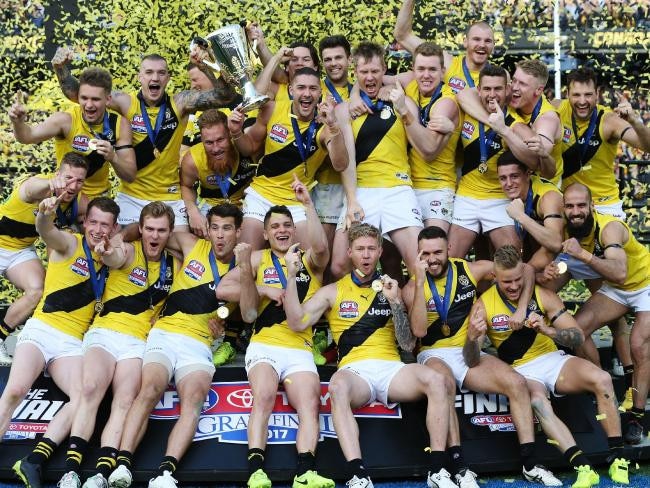 Jack Riewoldt's cheeky sign after winning flag.