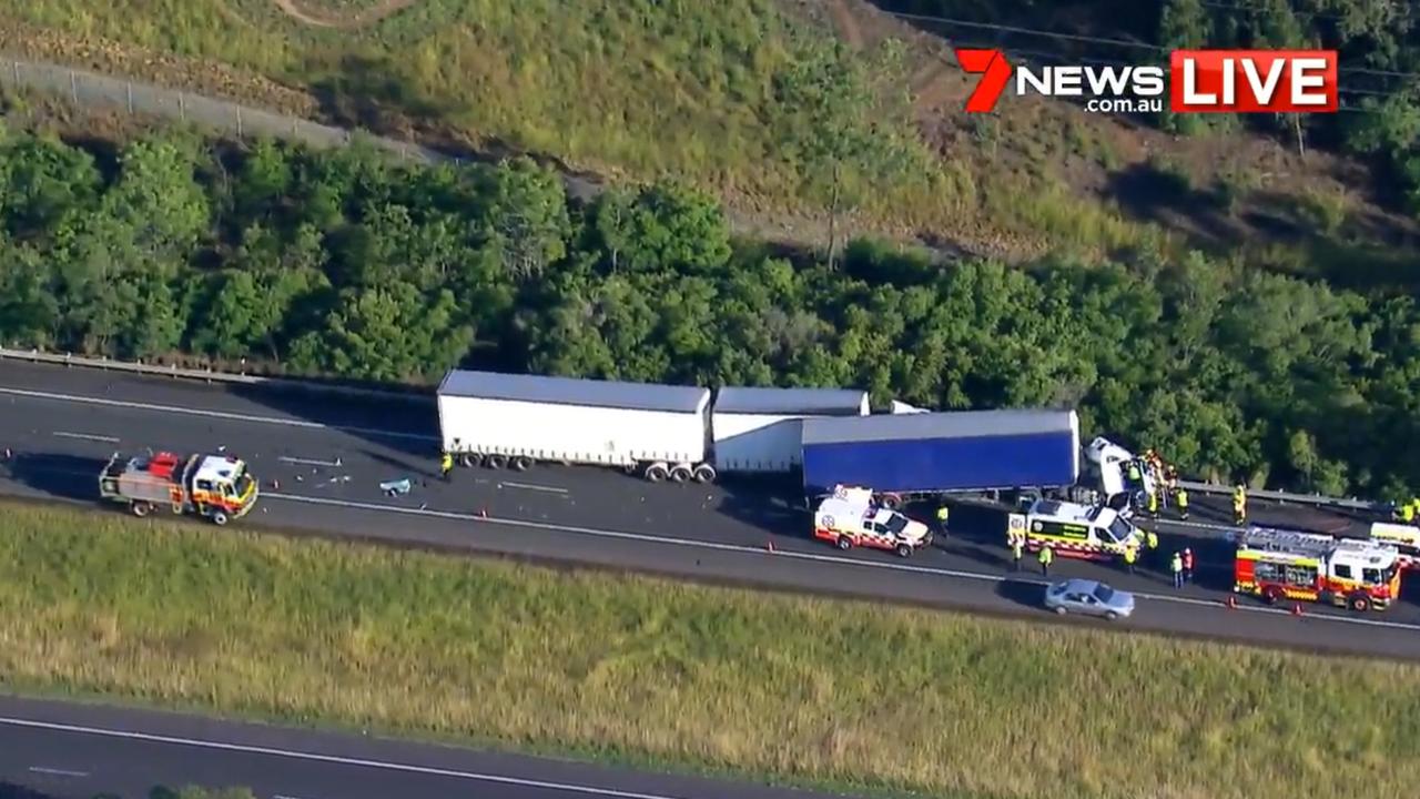 Hume Motorway crash Mount Annan accident leaves truck driver trapped