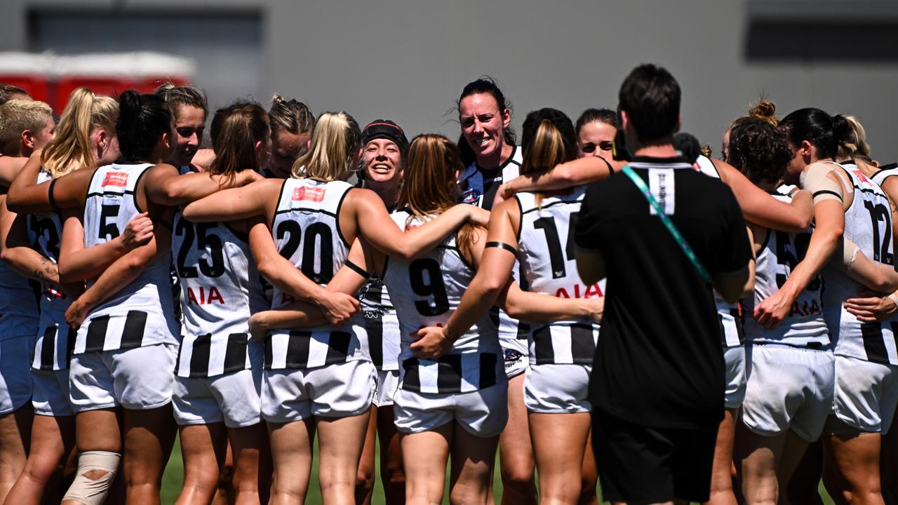 Collingwood players sing the team song after beating West Coast in Perth last weekend.