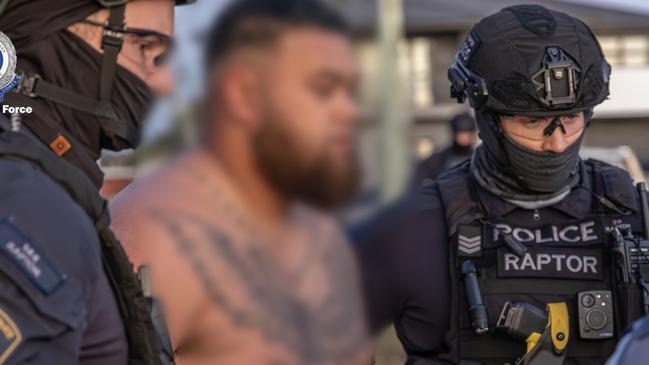 Police take the man into custody. Photo: NSW Police/Supplied