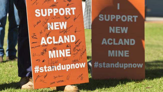 Signs express frustration over New Acland stage three. Picture: Kevin Farmer