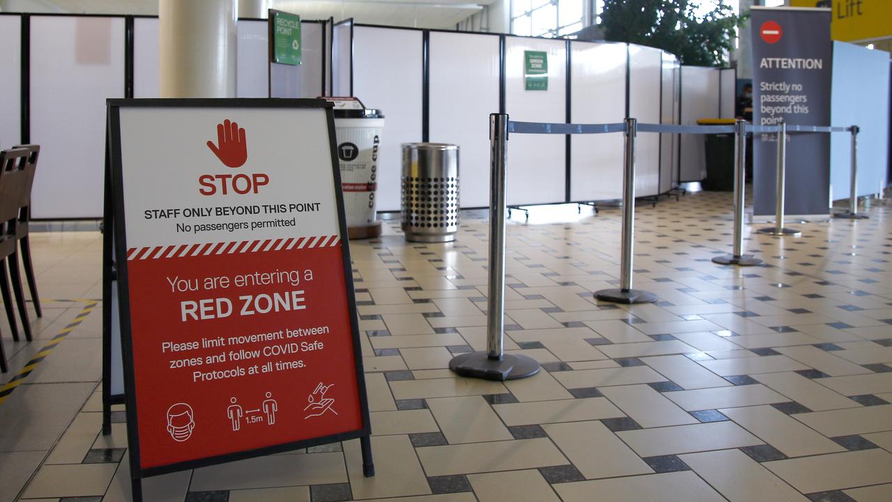 Signage showing the red zone at Brisbane Airport’s international terminal Photo: Tertius Pickard.