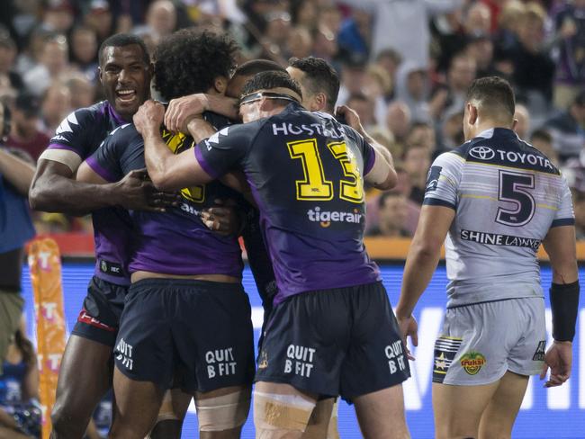 Felise Kaufusi of the Storm scores during the NRL grand final