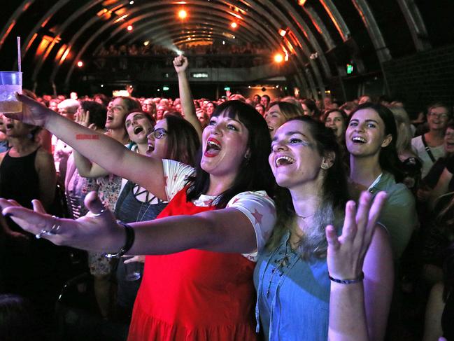 19/3/2018: L-R Michelle Jones (in red) and Yasmin Powell (in blue) , singing their hearts out as part of  the excited crowd, alcohol and singing,  on the first birthday of Brisbane's Pub Choir, at The Triffid, in Fortitude Valley, Brisbane. The choir  learn and perform a Powderfinger song Ð fitting, as The Triffid is co-owned by John Collins, Powderfinger's bassist. Lyndon Mechielsen/The Australian