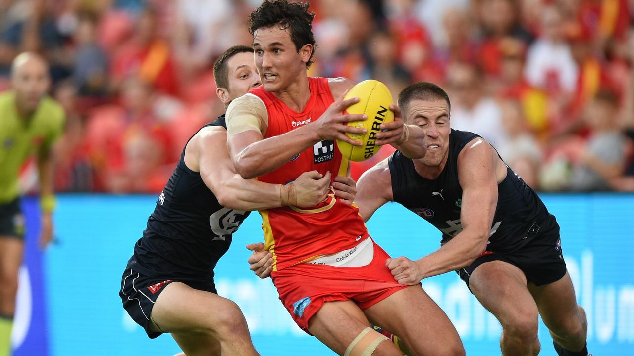 Wil Powell competes for the ball at Metricon Stadium. Picture: Getty Images