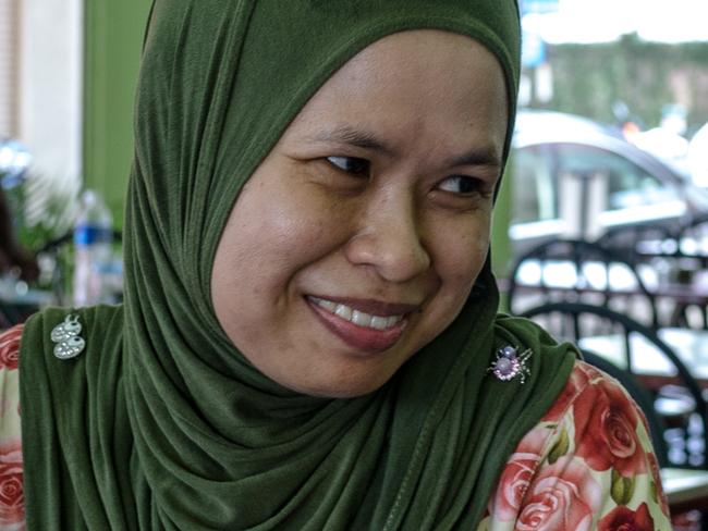 NO BYLINE: 35 year old Fatima Pardi reacts while speaking during an interview at a restaurant in Kuala Lumpur, Malaysia.