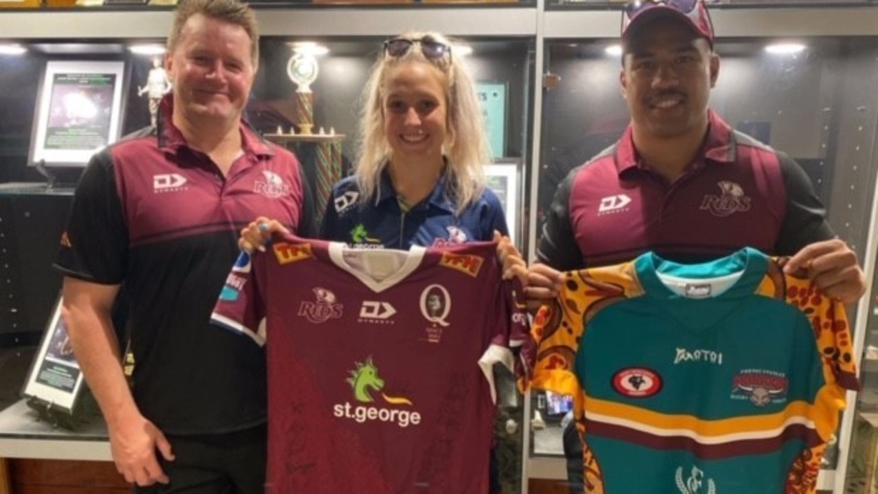 Jess Allen in her role with the Queensland Reds with Elton Flatley and Alex Mafi.