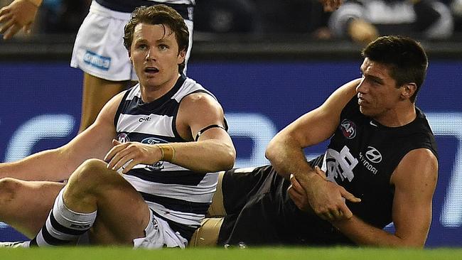 Patrick Dangerfield reacts after tackling Matthew Kreuzer. Picture: AAP Images