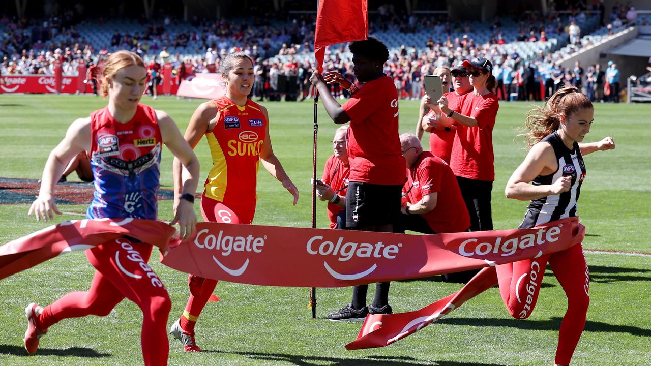 Alana Porter of the Magpies wins the Colgate grand final sprint.