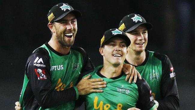 Glenn Maxwell and Peter Handscomb celebrate with young gun Seb Gotch (C).