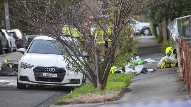 The quiet suburban street was littered with firefighting equipment on Wednesday morning. Picture: NewsWire / Jeremy Piper