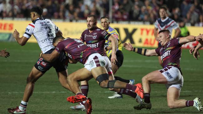 Sea Eagles players in the rainbow-trimmed Pride jersey.