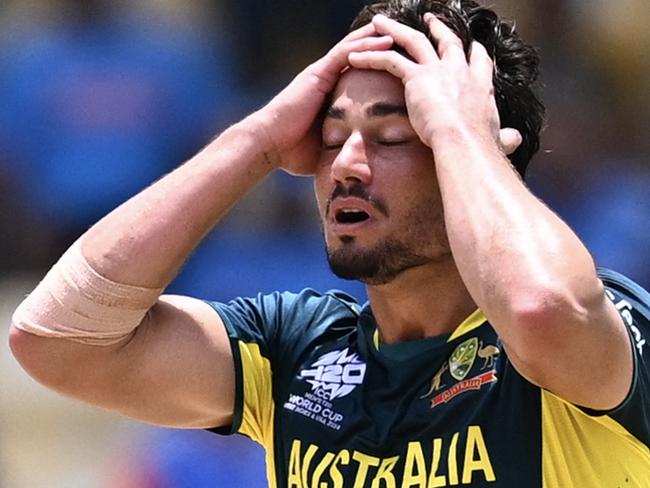 Australia's Marcus Stoinis reacts after dismissing India's Shivam Dube during the ICC men's Twenty20 World Cup 2024 Super Eight cricket match between Australia and India at Daren Sammy National Cricket Stadium in Gros Islet, Saint Lucia on June 24, 2024. (Photo by Chandan Khanna / AFP)