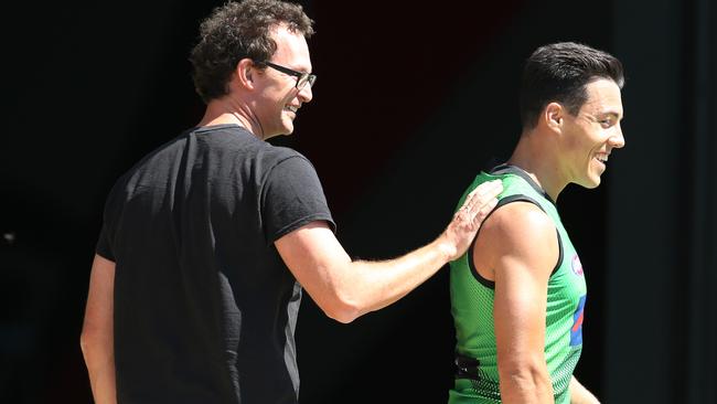 Dylan Shiel gets a pat on the back from Essendon CEO Xavier Campbell. Picture: Michael Klein