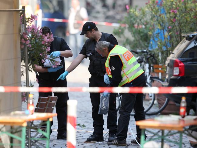 German police investigates at the site in Ansbach, Germany. Picture: AP