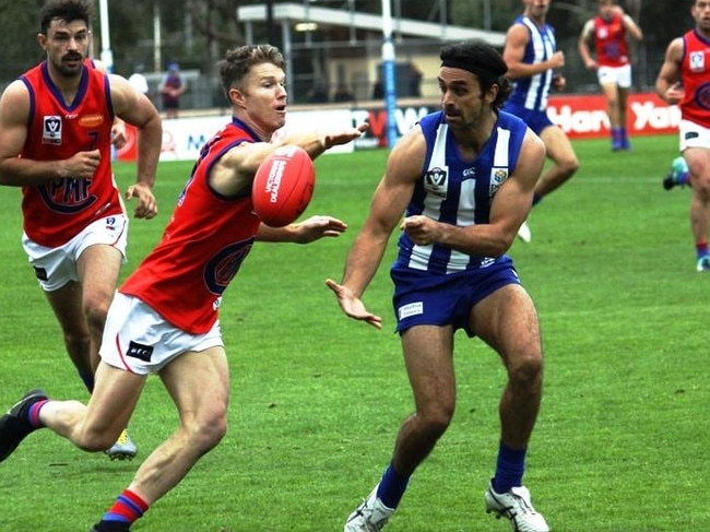 Ben Jolley spoils a North Melbourne player. Pic: Tony Cannatelli