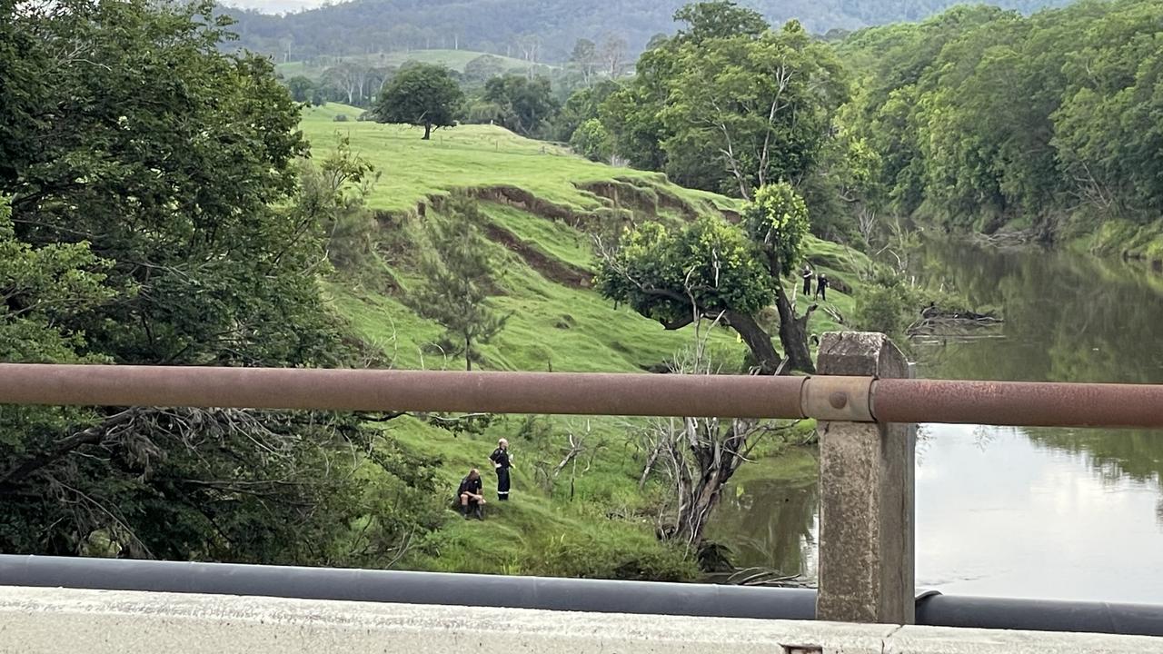 A rescue is under way for two people missing in the Mary River at Gympie on Boxing Day. Photo: Scott Kovacevic