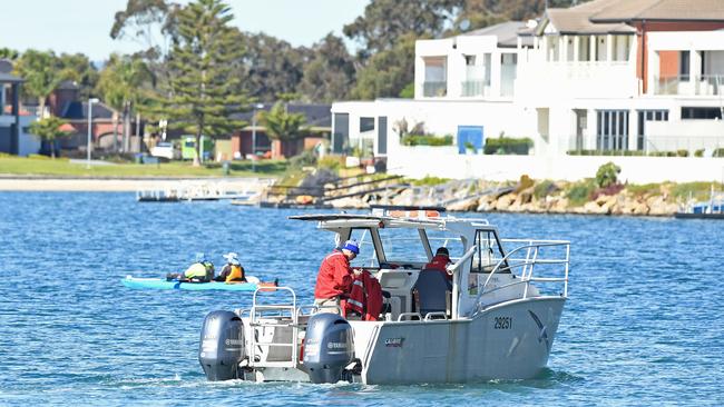 The EPA conducts water testing at West Lakes. Picture: Tom Huntley