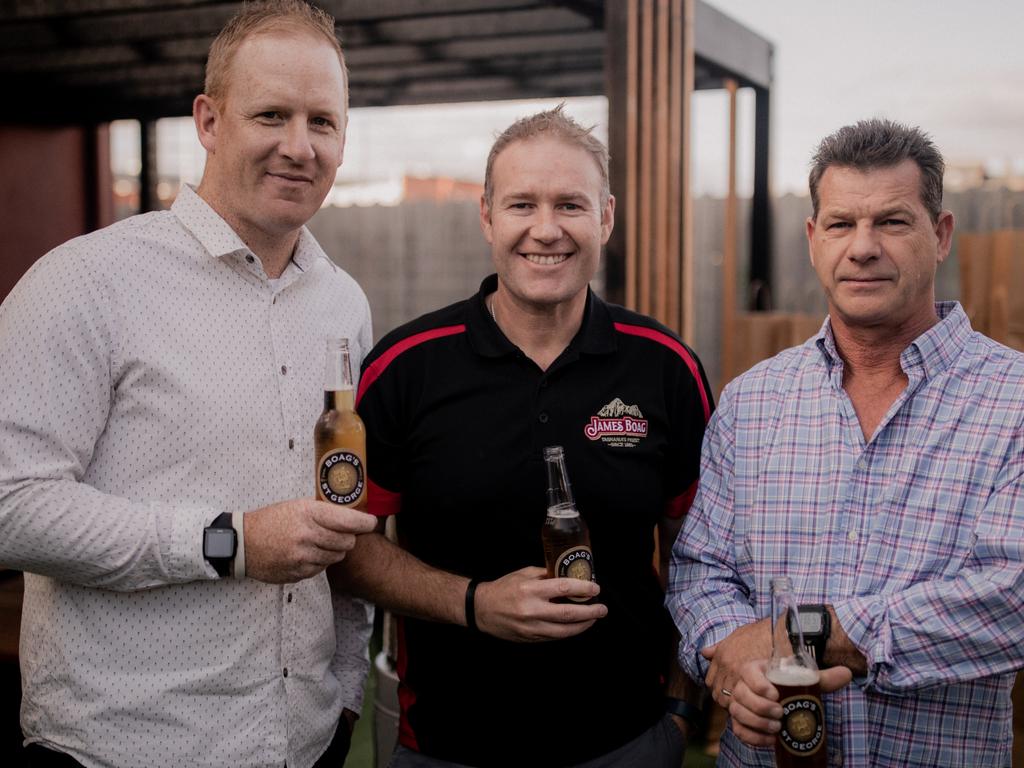 Brent Dolliver, of Lewisham, left, Josh Connors, of Cambridge, and Paul Gray, of Blackstone Heights, at the the relaunch of Boag’s St George beer. Picture: ROSIE HASTIE