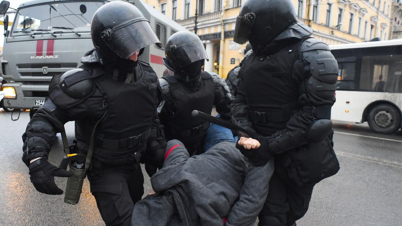 Police detain a man during a rally in support of jailed Opposition leader Alexei Navalny in Saint Petersburg on January 23. Picture: Olga Maltseva/AFP