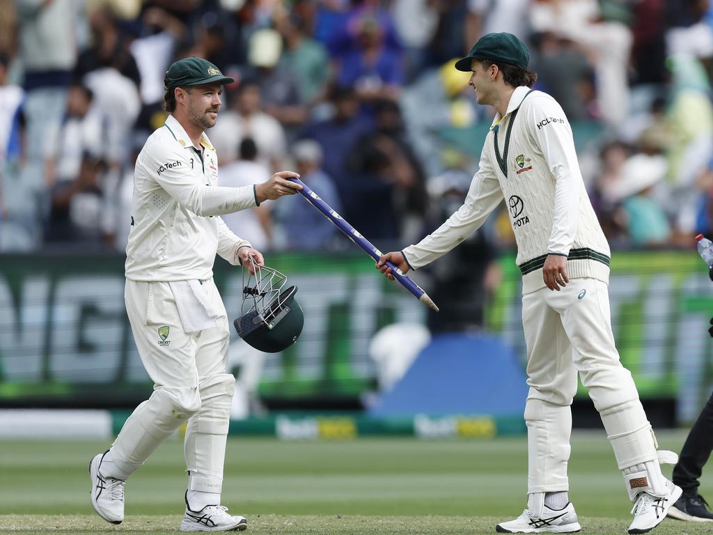 Travis Head shows his true colours by ensuring Sam Konstas gets a stump to remember his debut Test by. Picture: Michael Klein