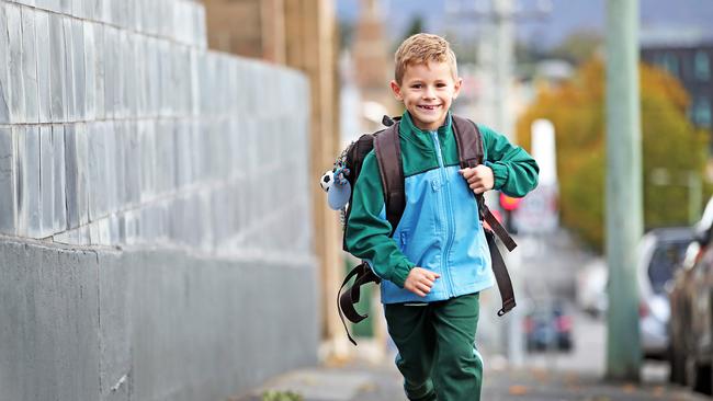 St Mary's College grade 1 student, Cooper Nicholson, 7, of Midway Point enjoyed his first day back at school. Picture: ZAK SIMMONDS