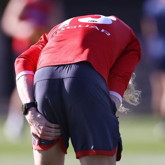 Oliver felt at his hamstring at one point as he trained at Gosch’s Paddock with the Demons on Monday. Picture: Michael Klein