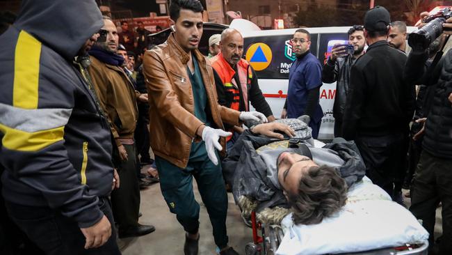 At least 100 Palestinians have been killed by Israeli attacks in Gaza in one day with hundreds of others wounded. Picture: Getty Images