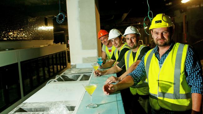 Shooters nightclub is reopening next month, two years after a fire ripped through it. Workmen (L-R) Rick Stibbard, Jake Kiel, Josh Sloane and Dion Colefax at the shell of the new bar. Photo: Kit Wise