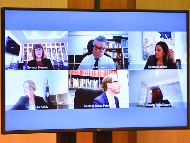 Senators on the big screen wait to remotely question Secretary to the Treasury Dr Steven Kennedy during a Senate Inquiry Select Committee on COVID-19. Picture: AAP