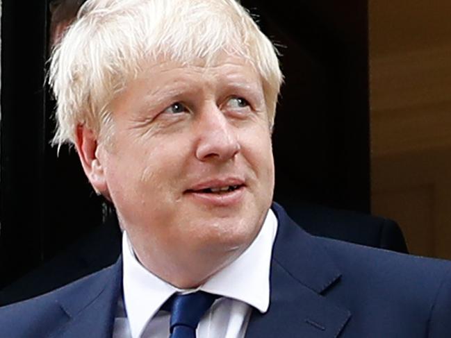 Conservative leadership candidate Boris Johnson leaves his campaign offices in Westminster in Central London on July 22, 2019 on the eve of the announcement of the winner of the Conservative Party leadership contest. - Britain's leadership contest entered its finale Monday with the favourite Boris Johnson facing more defections from ministers over his Brexit plan. The month-long contest between former London mayor Johnson and Foreign Secretary Jeremy Hunt is being decided by fewer than 200,000 grassroots members of the governing Conservative Party. The winner will have three months to resolve a three-year Brexit crisis that could damage economies on both sides of the Channel and determine the fate of generations of Britons. (Photo by Tolga AKMEN / AFP)