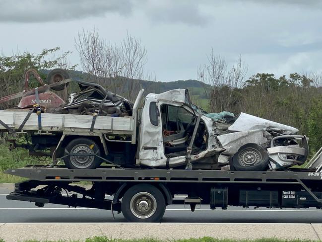 Police closed the Bruce Highway at Glenella after a ute and a truck carrying debris crashed. Photo: Janessa Ekert