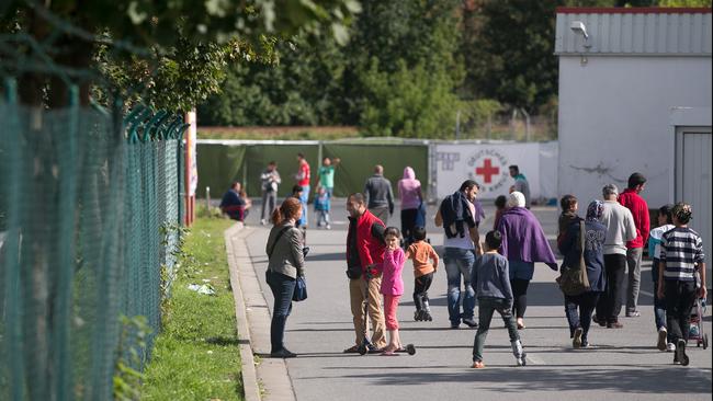 Refugees from Syria, Asia and the Middle East at a temporary refugee camp in the town of Heidenau in East Germany, in 2015. Picture: News Corp