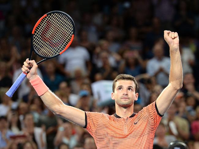 BRISBANE, AUSTRALIA - JANUARY 08: Grigor Dimitrov of Bulgaria celebrates victory against Kei Nishikori of Japan after the Men's Final on day eight of the 2017 Brisbane International at Pat Rafter Arena on January 8, 2017 in Brisbane, Australia. (Photo by Bradley Kanaris/Getty Images)