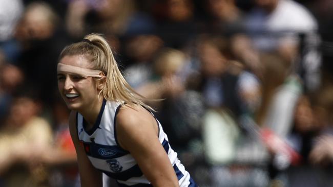 WARRNAMBOOL, AUSTRALIA - OCTOBER 09: Amy McDonald of Geelong runs with the ball during the round seven AFLW match between the Essendon Bombers and the Geelong Cats at Reid Oval on October 09, 2022 in Warrnambool, Australia. (Photo by Darrian Traynor/AFL Photos/via Getty Images)