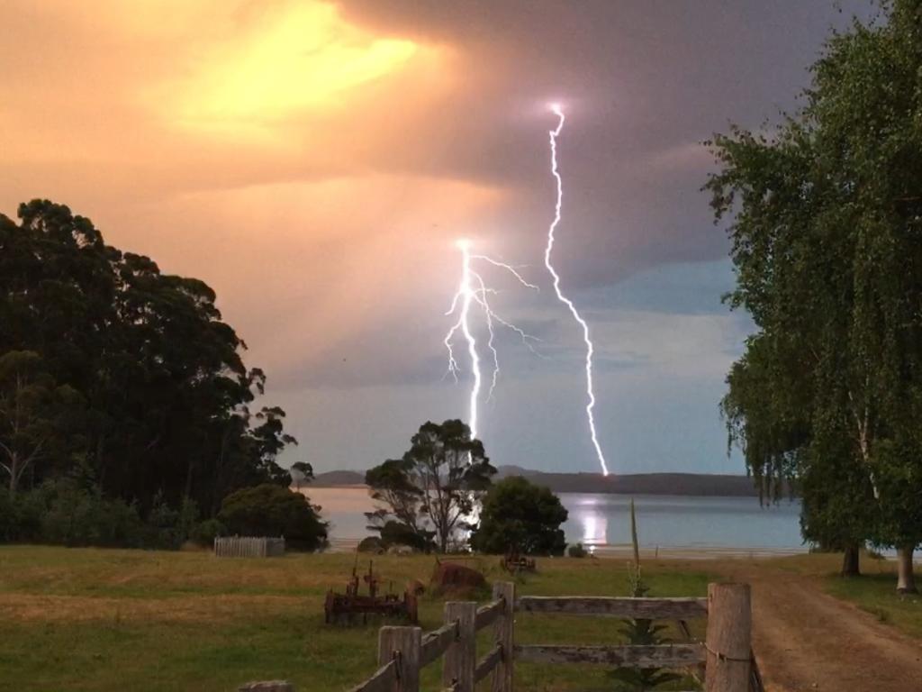 Lightning as seen from Koonya, overlooking Norfolk Bay, on the Tasman Peninsula. Picture: Marcus Clark