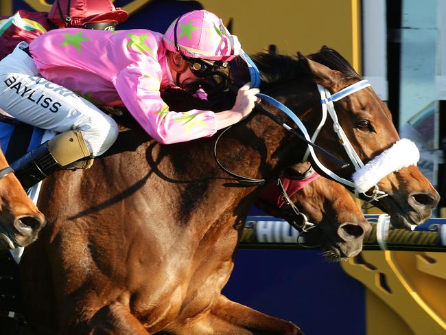 Caulfield Races   Race 9  Kenjorwood (no3) centre ridden by Regan Bayliss wins Race 9 ahead of Jacquinot (no4) and Extra Nobel (no14)   Picture: Norm Oorloff