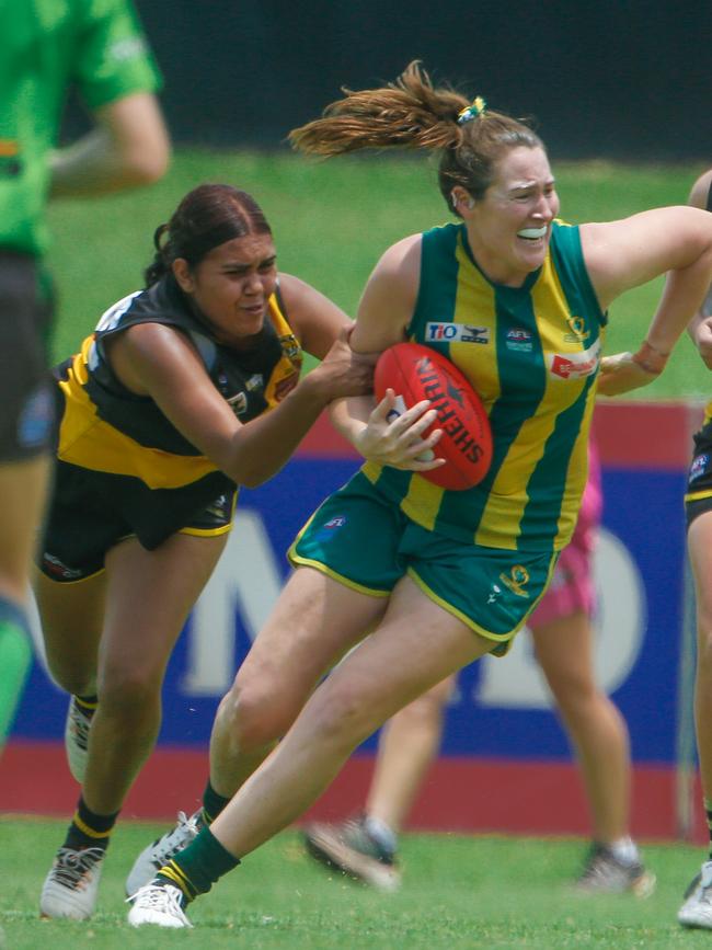 Nightcliff’s Danielle Djanghara-Cooper tries to bring down PINT’s Casey Morris in the Women’s NTFL Round 13 clash. Picture: Glenn Campbell